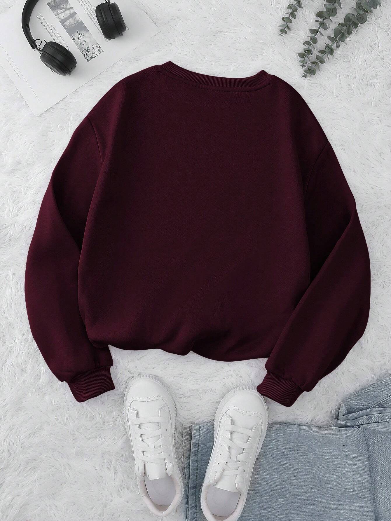 INAWLY burgundy long sleeve pullover sweatshirt laid flat with casual jeans